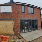 Wide angle shot of the outside of a recent double storey extension