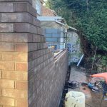 A progress picture of brick work on an extension building